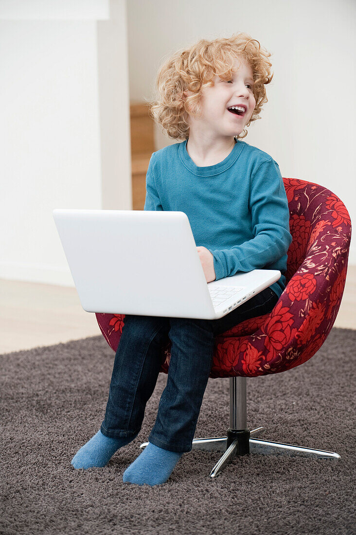 Boy using a laptop