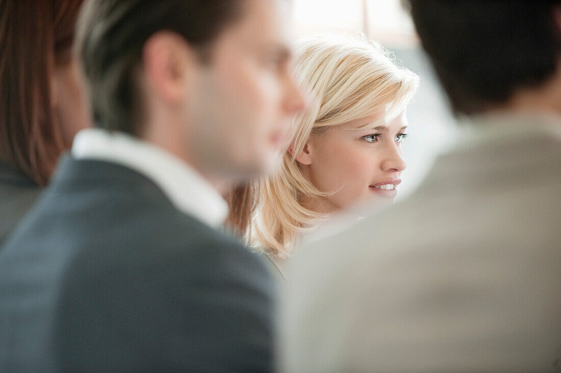 Close-up of a businesswoman with her colleague