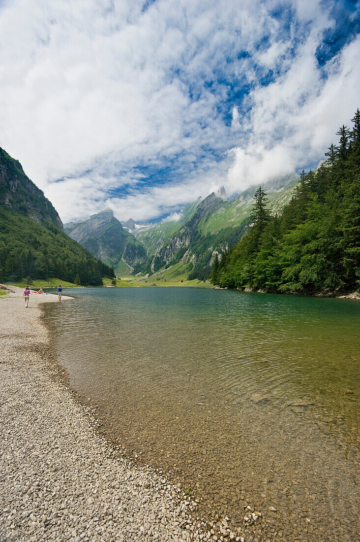 The lake Seealpsee under clouded sky, Alpsteingebirge, Saentis, Appenzeller Land, Switzerland, Europe