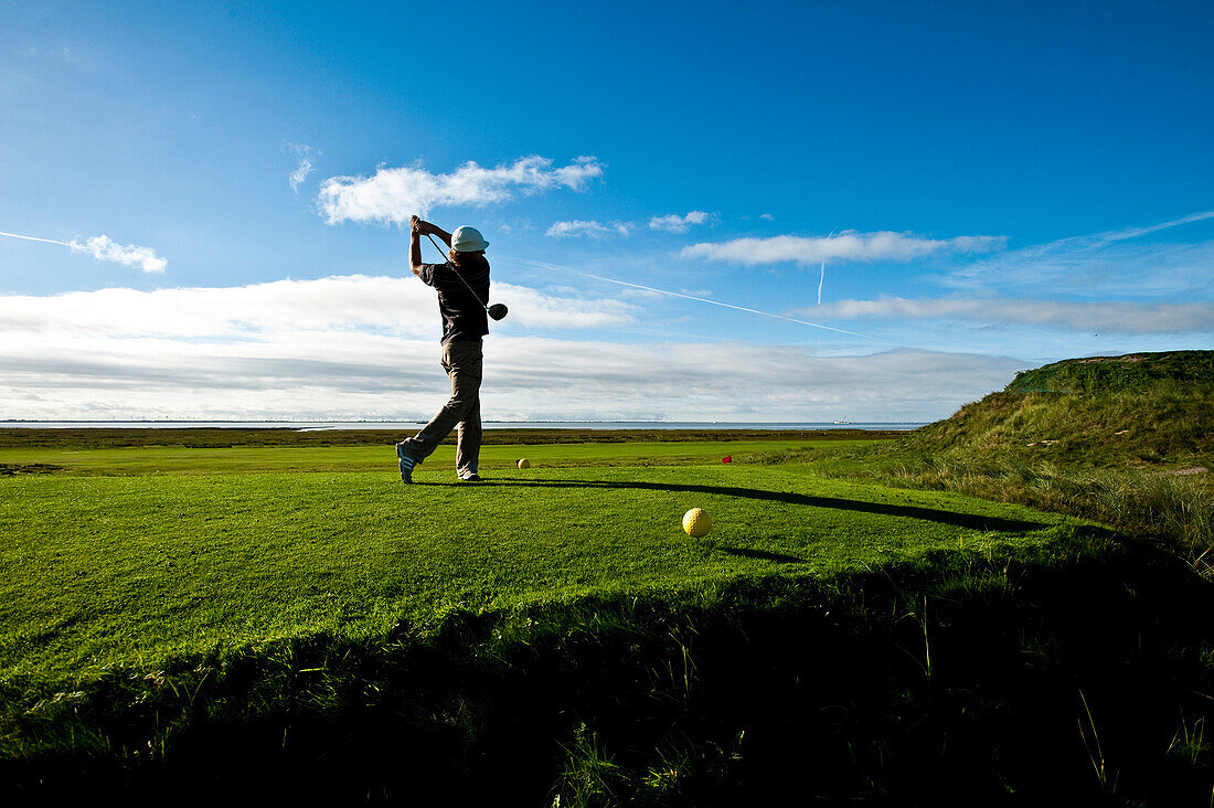 Person playing golf, Norderney, East Frisian Islands, Lower Saxony, Germany