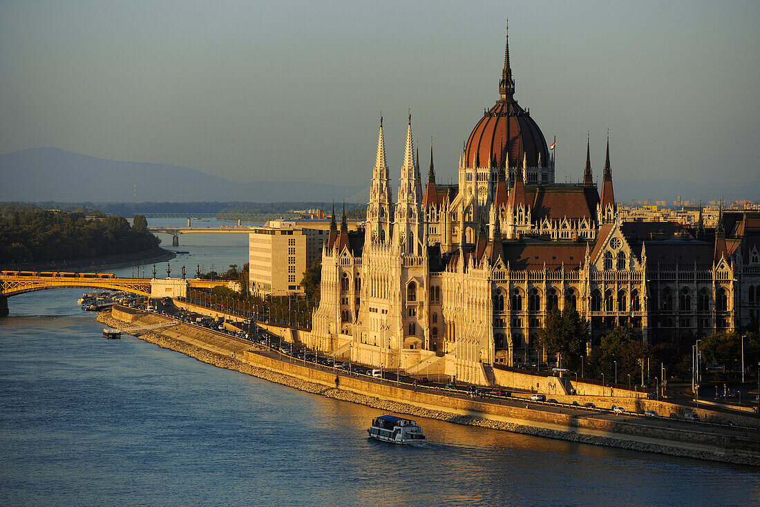 House of Parliament at Danube river in the light of the evening sun, Budapest, Hungary, Europe