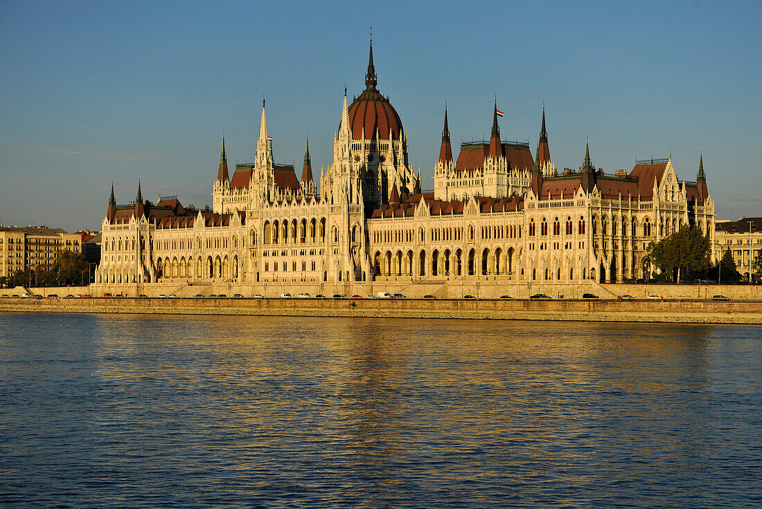 House of Parliament at Danube river in the light of the evening sun, Budapest, Hungary, Europe