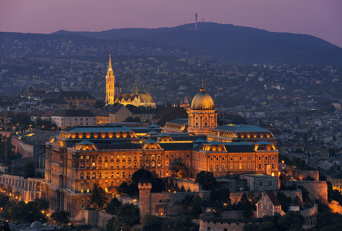 Castle hill with illuminated castle in the evening, Budapest, Hungary, Europe