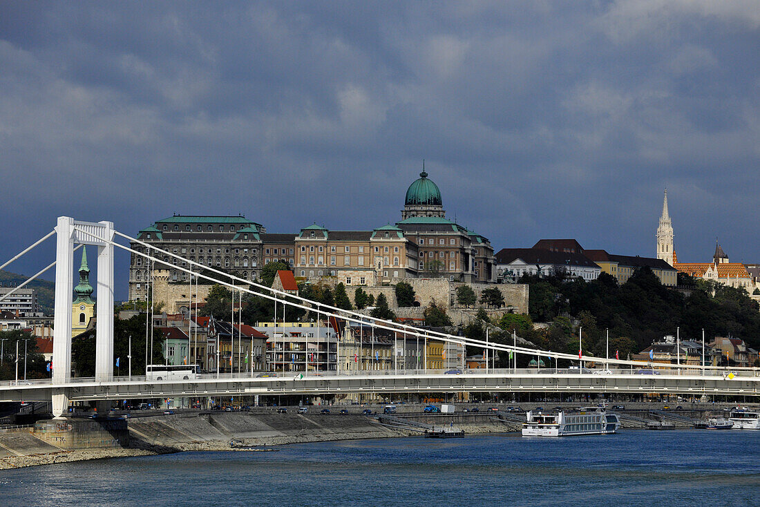 Elisabeth Bridge and Castle Hill under clouded sky, Budapest, Hungary, Europe