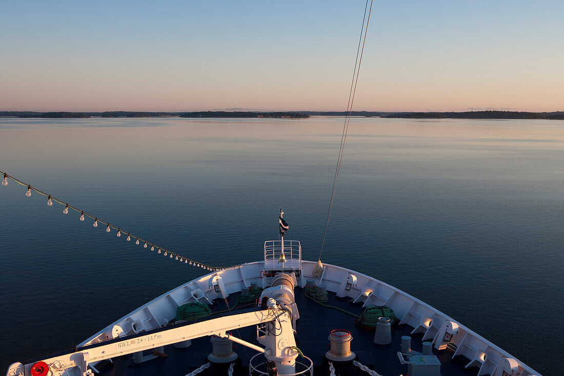 Bow of cruise ship MS Astor, Transocean Kreuzfahrten at sunrise, Stockholm archipelago, near Stockholm, Sweden