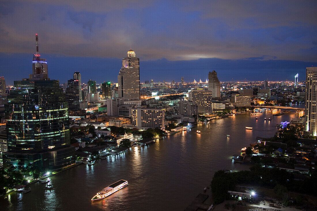 Skyline at night seen from Three Sixty Bar of Millennium Hilton Hotel, Bangkok, Thailand