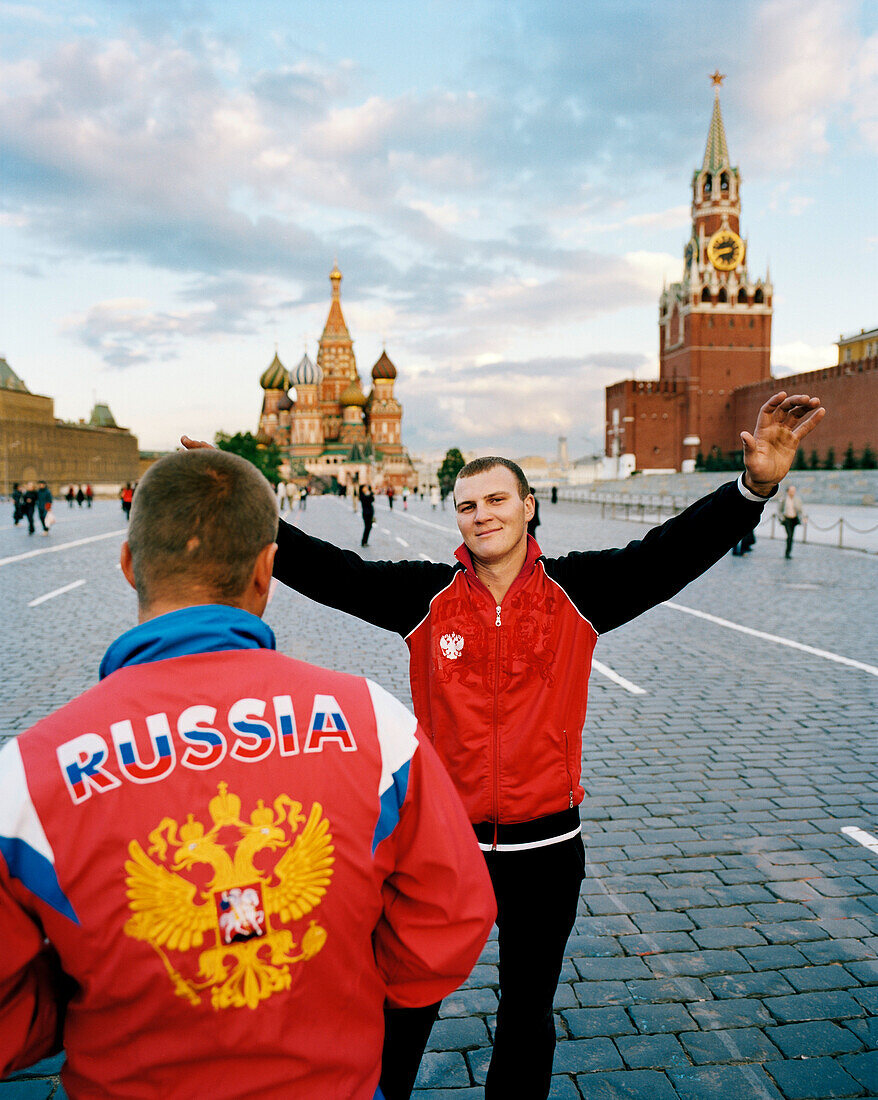 Young russians in front of the St. Basil's Cathedral on Red Square, Moscow, Russia, Europe