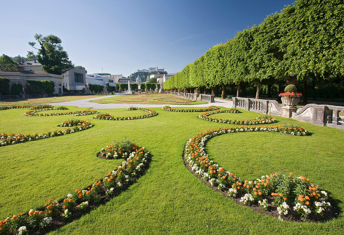 View over Mirabell gardens of Mirabell castle onto Hohensalzburg castle, Salzburg, Austria, Europe