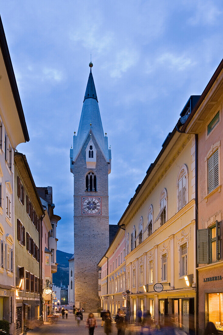Pedestrian area and steeple in the city in the evening, Brixen, Valle Isarco, South Tyrol, Alto Adige, Italy, Europe