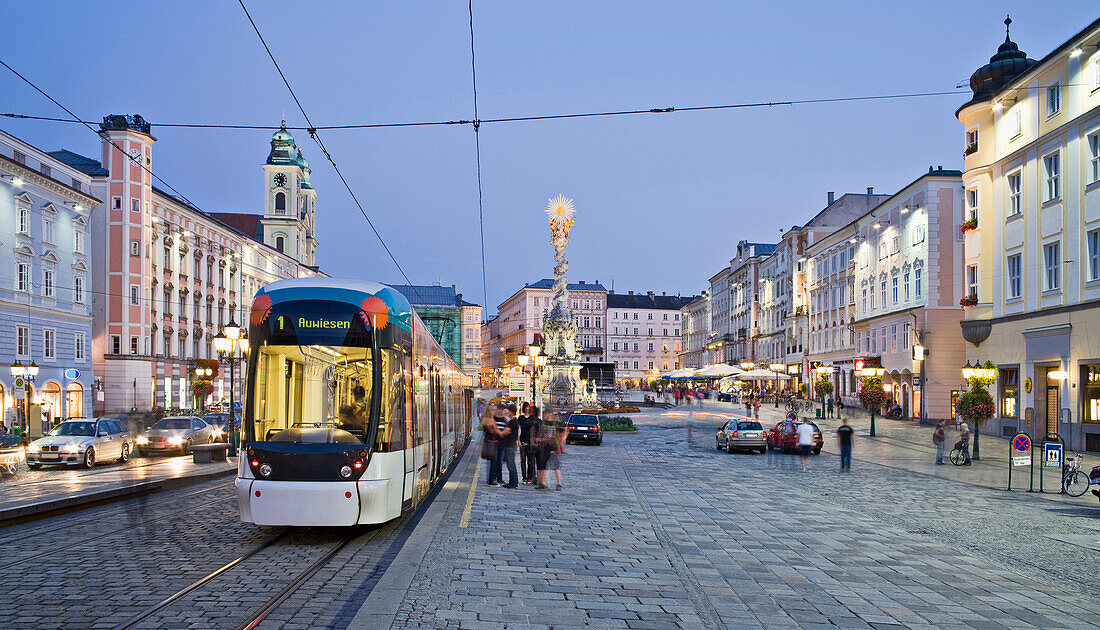 Hauptplatz with tram and old cathedral in the evening, Linz, Upper Austria, Austria, Europe