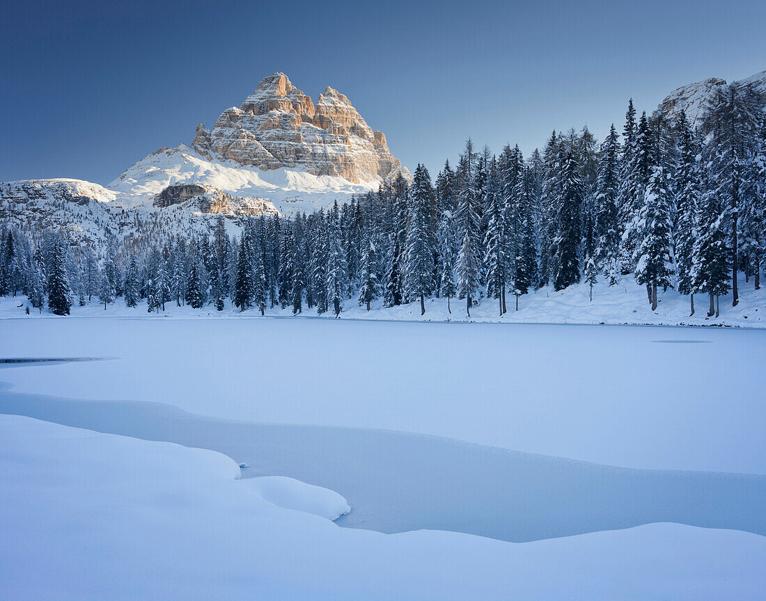 The frozen lake Lago Antorno in front of the Three Peaks, Sexten Dolomites, Veneto, Italy, Europe