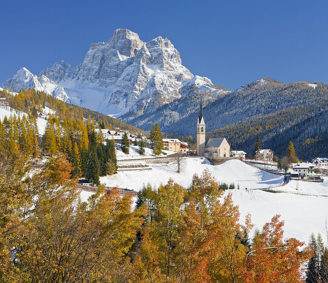 The snow covered mountain village Selva di Cadore in front of Monte Pelmo mountain, Dolomites, Veneto, Italy, Europe