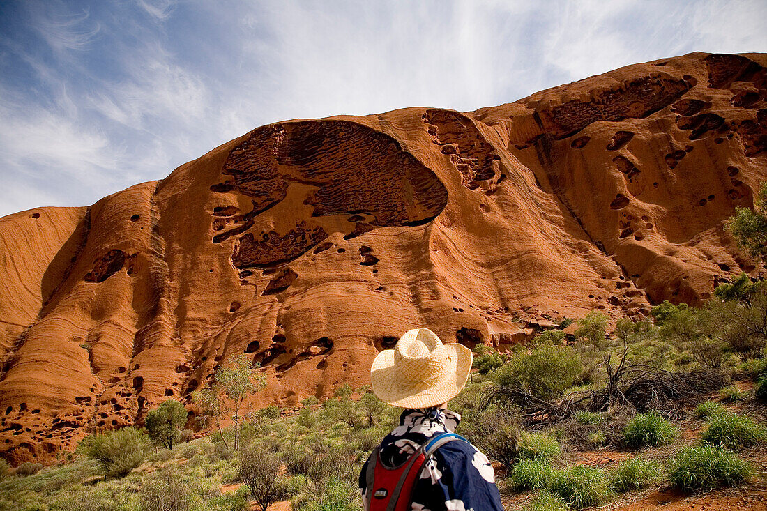 Tourist observing rock formation at Watarrka National Park, Northern Territory, Australia