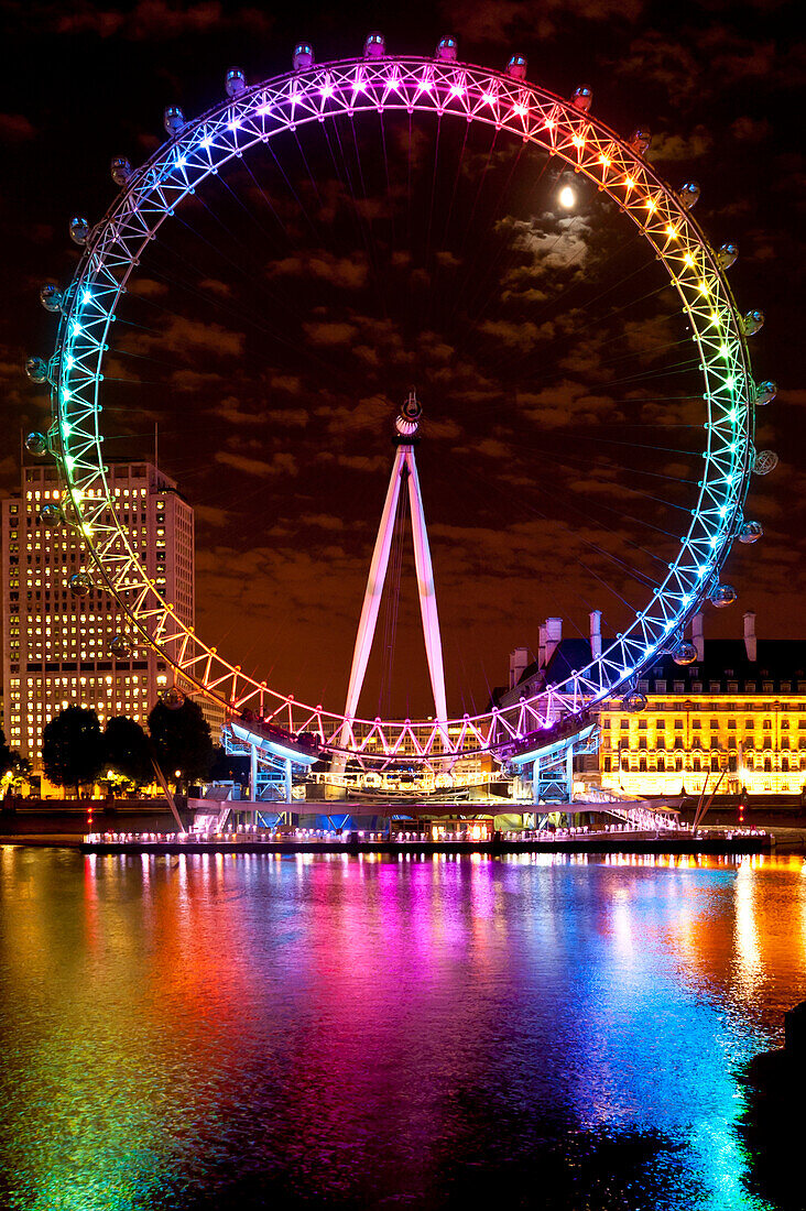 Big Wheel aka London Eye lit up with the rainbow colours during Pride night, London, UK