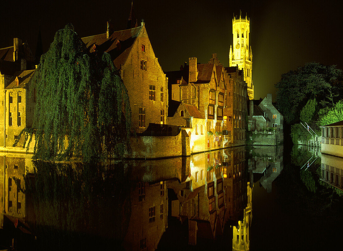 Canal view with clocktower at night, Bruges, Belgium