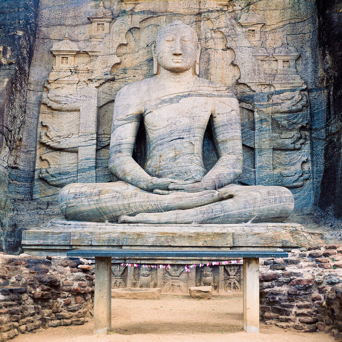 A giant stone carved seated Buddha, Gal Vihara, Polonnaruwa (Polonnaruva), UNESCO World Heritage Site, Sri Lanka, Asia.