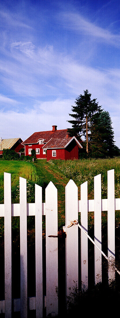 Red house and white picket fence, Sweden