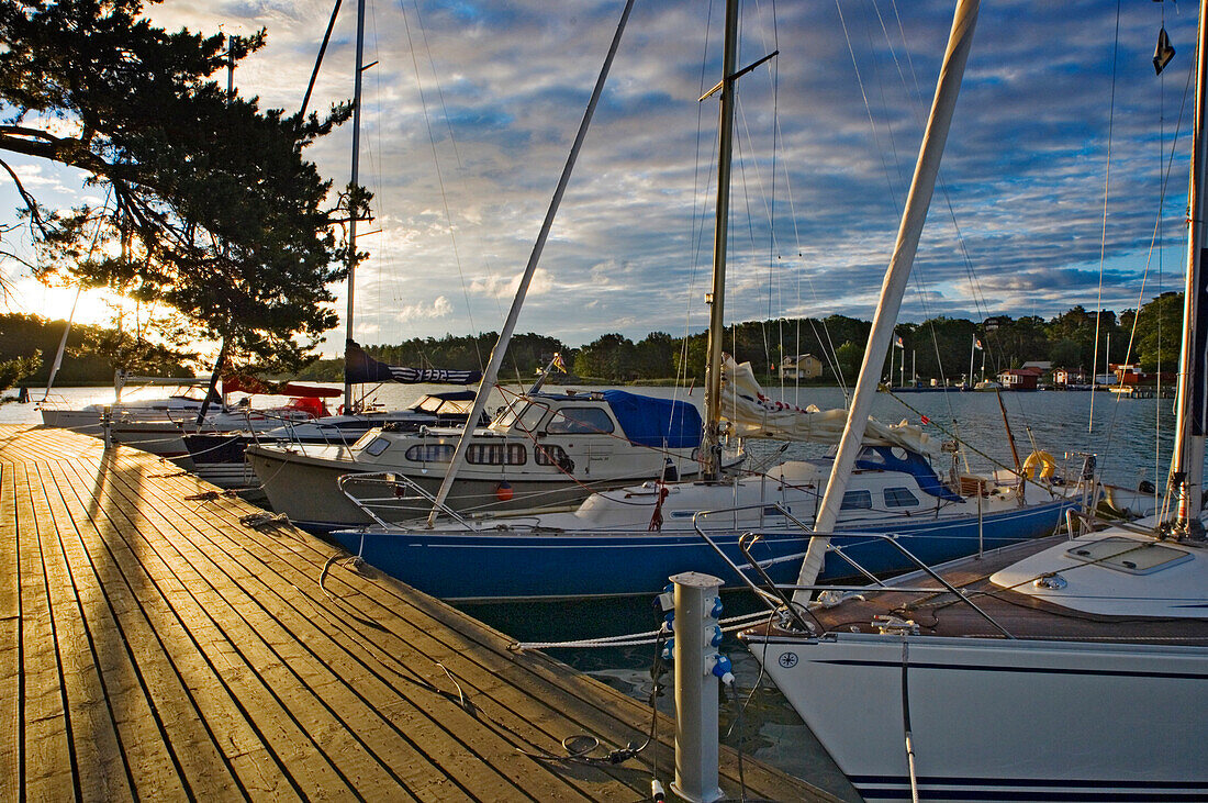 Boats lining up along the pier in marina, Uto Island, Stockholm, Sweden.