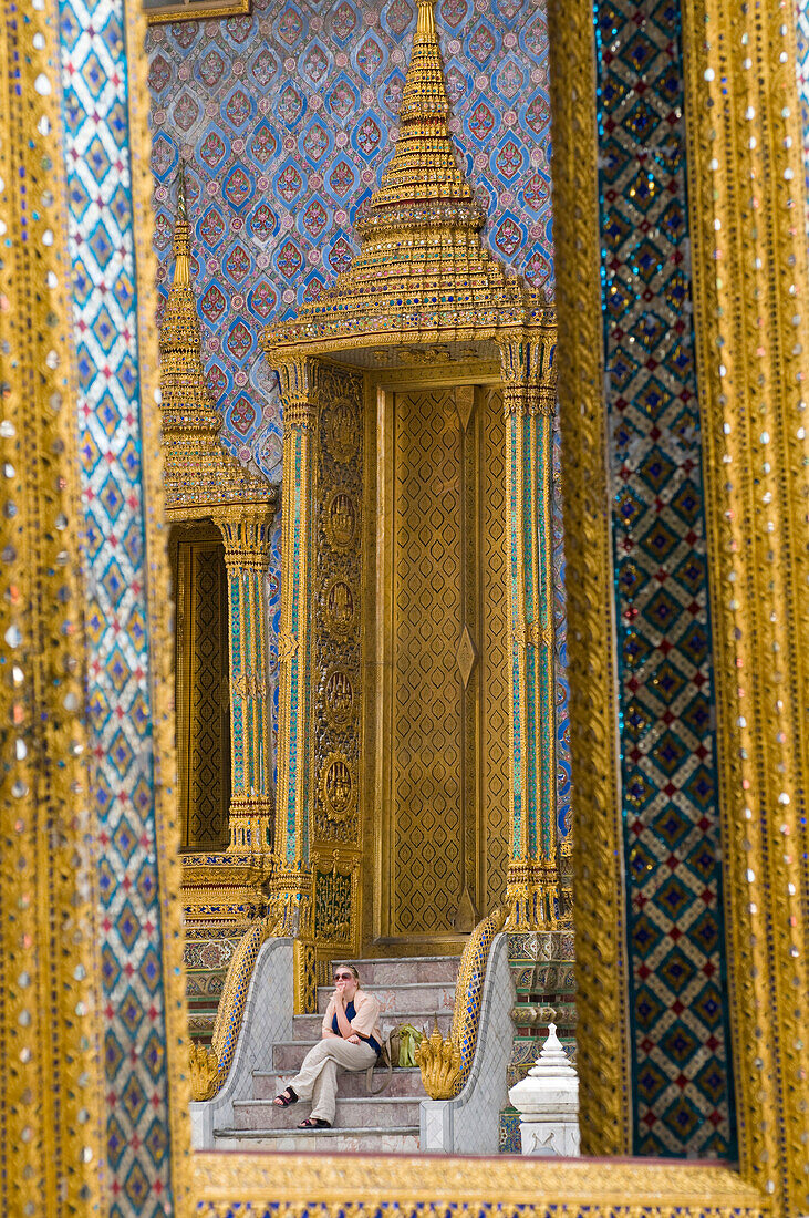 Tourist in Wat Phra Kaew temple, Royal Palace, Bangkok, Thailand