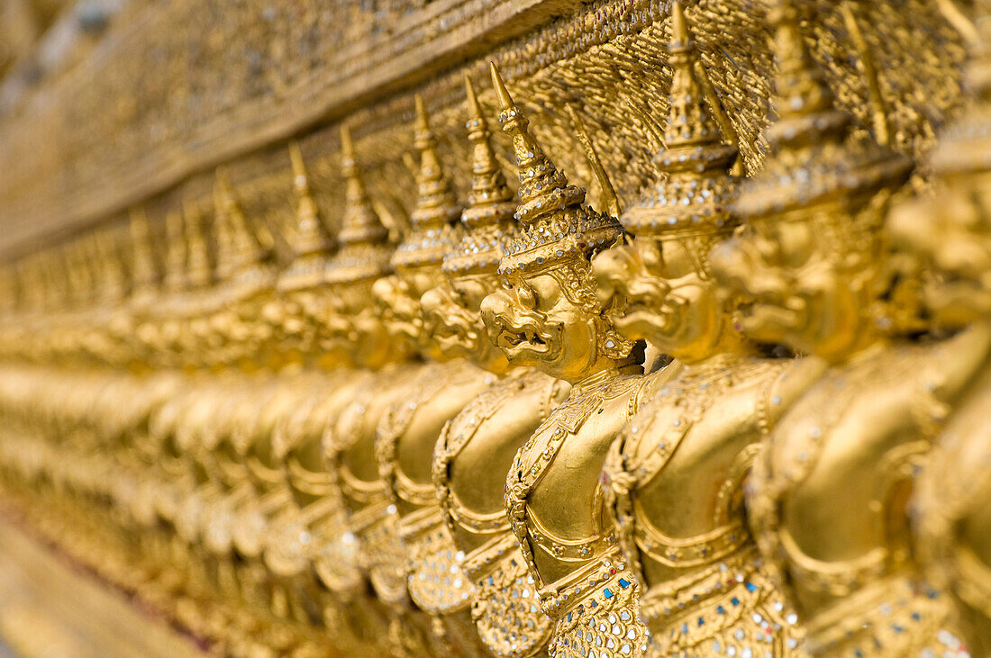 Statues surrounding Wat Phra Kaew temple, Royal Palace complex, Bangkok, Thailand