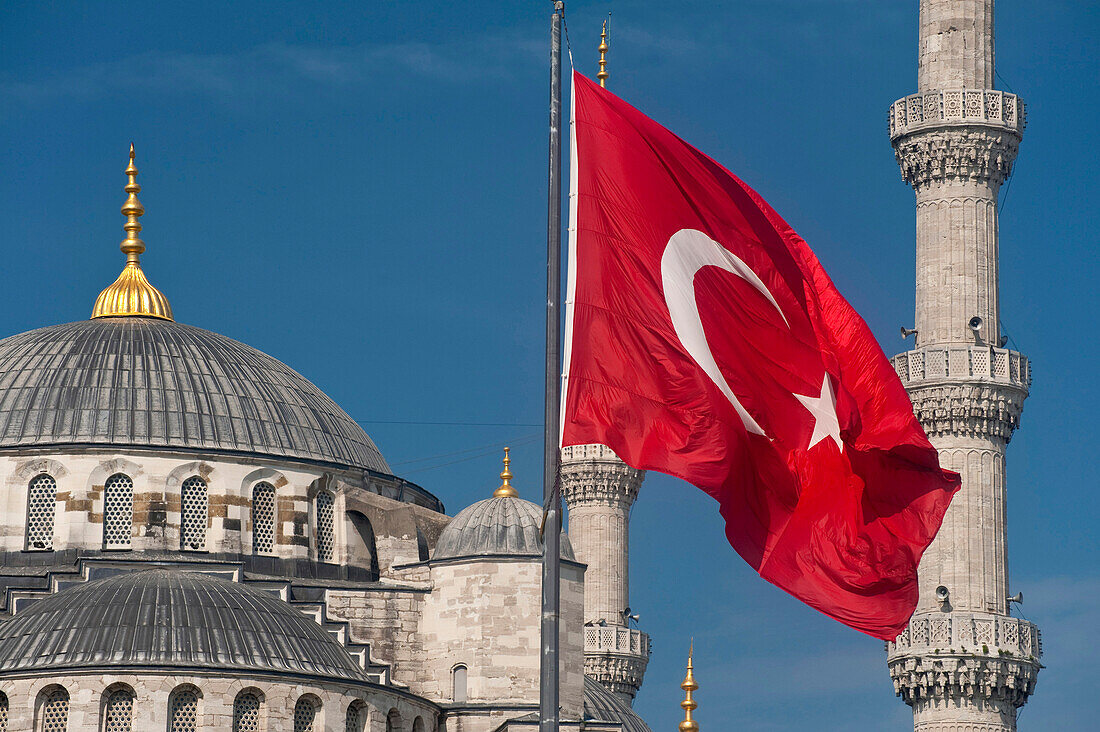 Turkish flag in front of the Sultanahmet or Blue Mosque, Istanbul, Turkey.