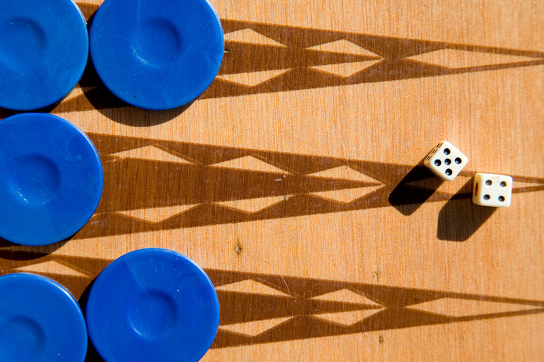 Backgammon board and dice in the sunshine, Close Up, Fethiye, Mugla, Turkey