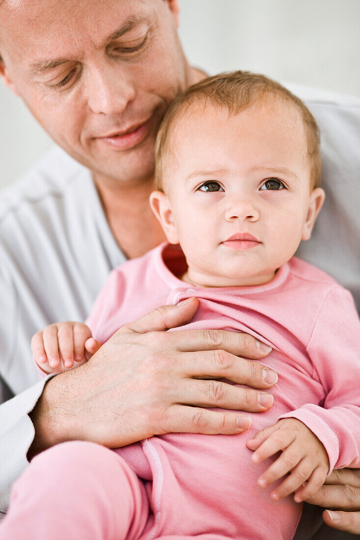 Man holding his daughter