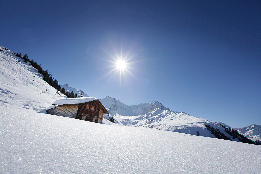 Alpine hut in snow, Kloesterle, Arlberg, Tyrol, Austria