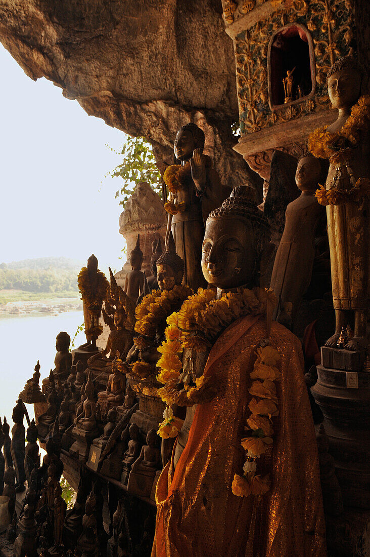 Buddha statues, Pak Ou caves, Mekong river, north of Luang Prabang, Laos
