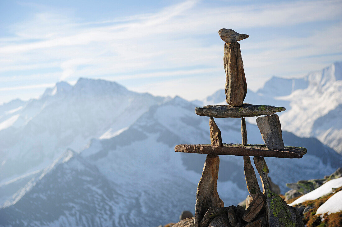 Cairn at Peterskoepfl with view towards Zillertal mountain range, Zillertal Alps, Zillertal, Tyrol, Austria