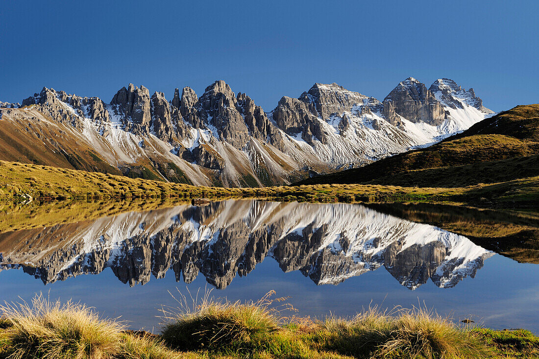 Kalkkoegel reflecting in a mountain lake, Salfains, Stubai, Stubai Alps, Tyrol, Austria