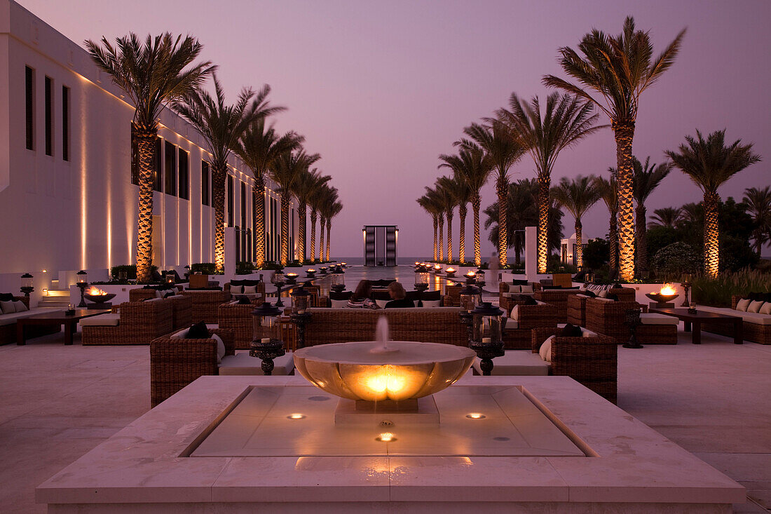 The Long Pool, The Chedi Muscat hotel at dusk, Muscat, Masqat, Oman, Arabian Peninsula
