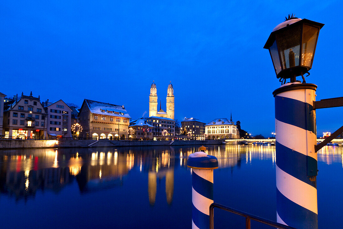 Pier at the Hotel Storchen, old town center, river Limmat at night, Limmatquai Grossmunster, Zurich, Switzerland