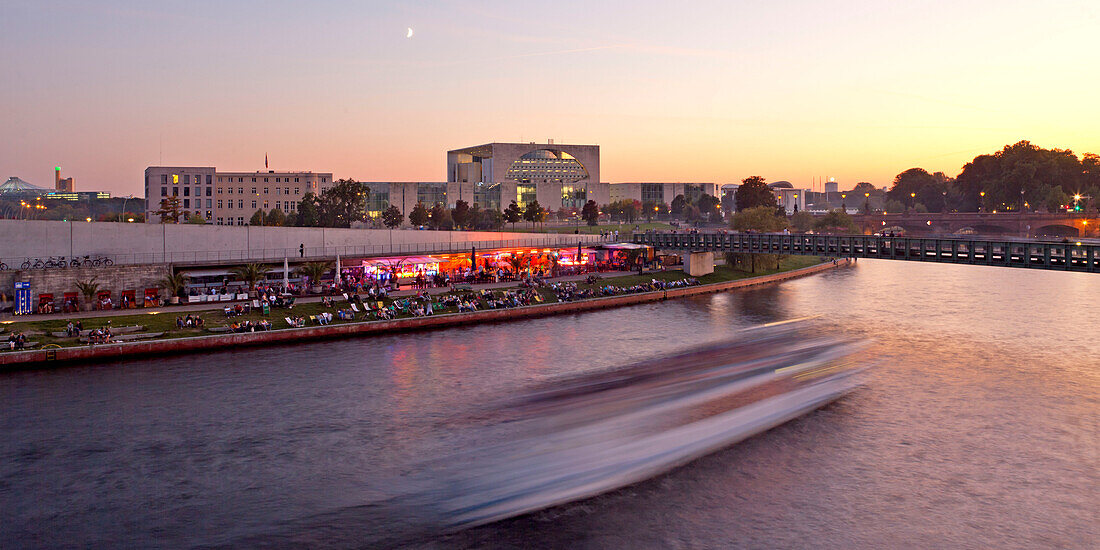 Capital beach cafe and federal chancellery at the river Spree at sunset, Berlin, Germany, Europe