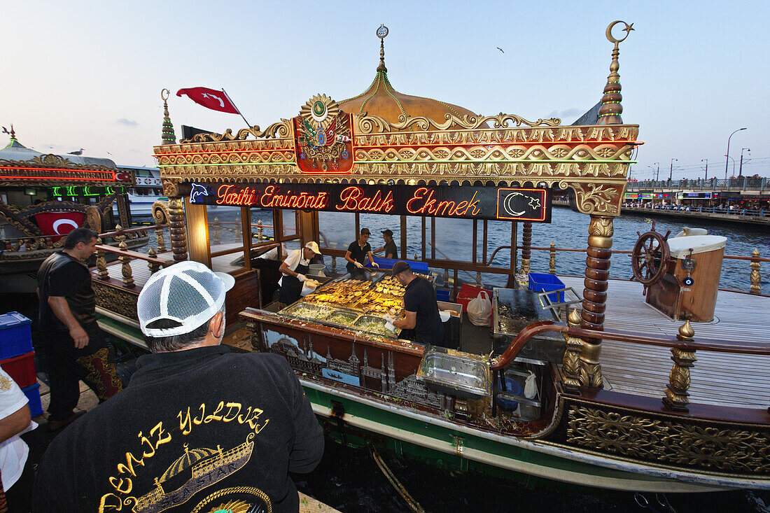 Fresh fish sandwiches made on the waterfront Eminonu, Istanbul, Turkey, Europe