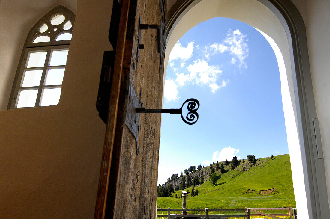 View out of the door of Zallinger church, Alpe di Siusi, South Tyrol, Italy, Europe