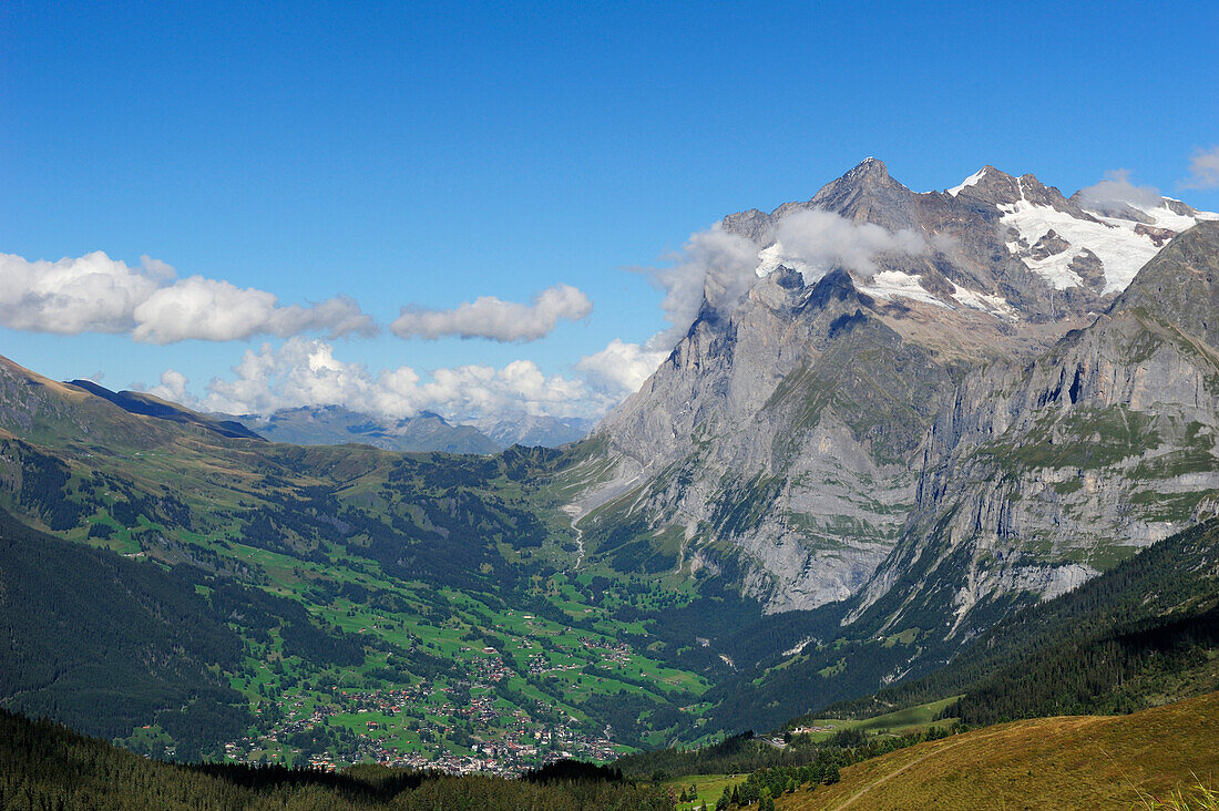 View over Grindelwald to Grosse Scheidegg and Wetterhorn, UNESCO World Heritage Site Jungfrau-Aletsch protected area, Bernese Oberland, canton of Bern, Switzerland
