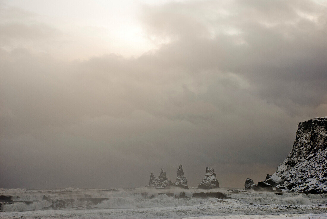 Rock Formations and Waves Against Dramatic Clouds, Vik, Iceland