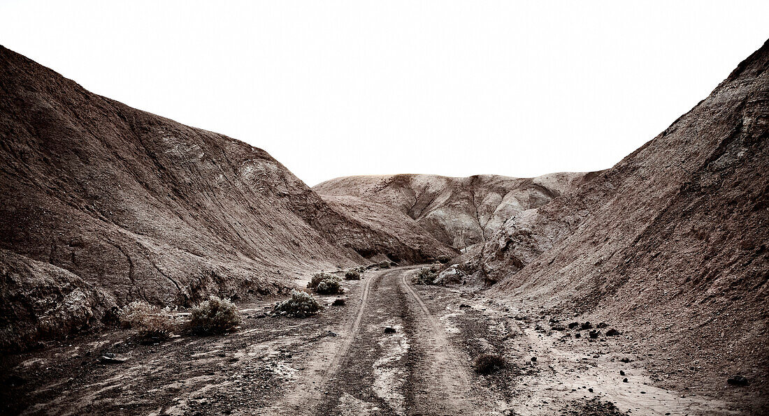 Trail Through Arid Mountain Landscape, Death Valley, California, USA