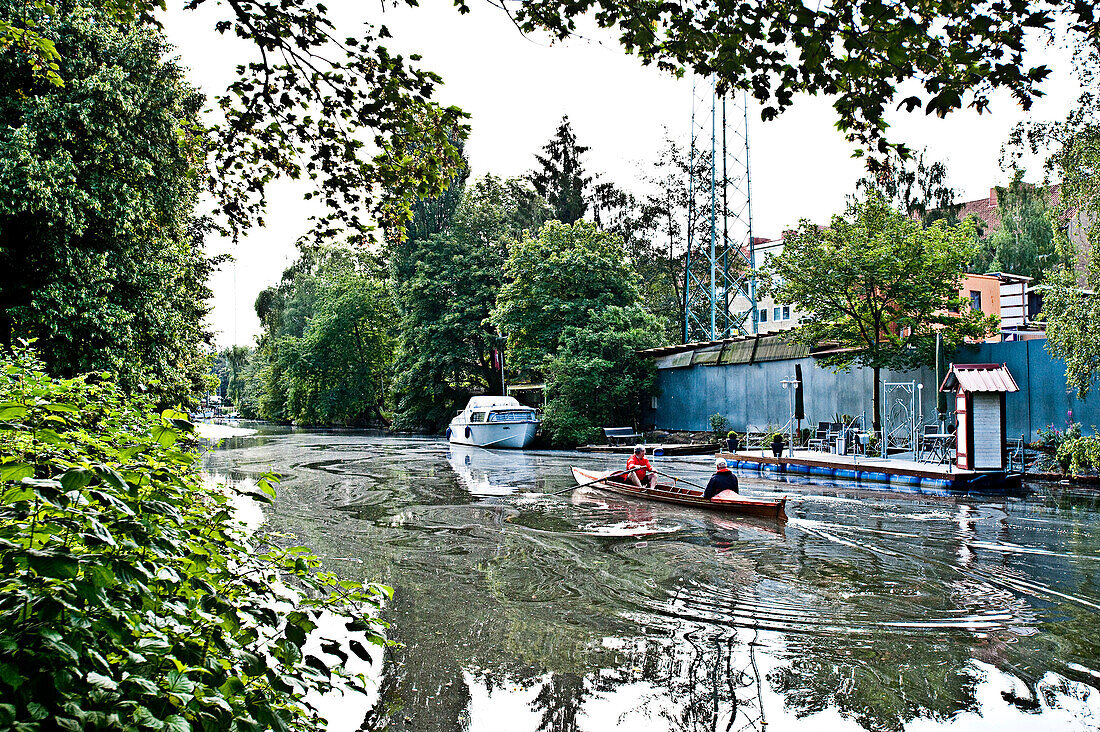 Rower on the Ernst-August-Canal, Wilhelmsburg, Hamburg, Germany