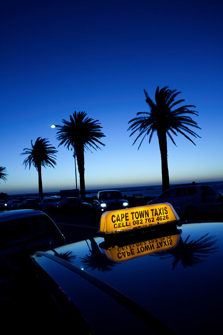 Sun-set impression on Victoria Road at Camps Bay, Cape Town, Western Cape, South Africa, RSA, Africa