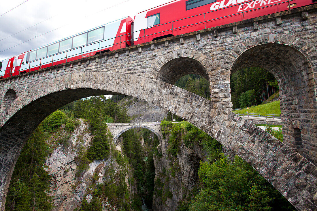 Train, Glacier Express, crossing the Solis Bridge over Schyn gorge, Graubuenden, Switzerland