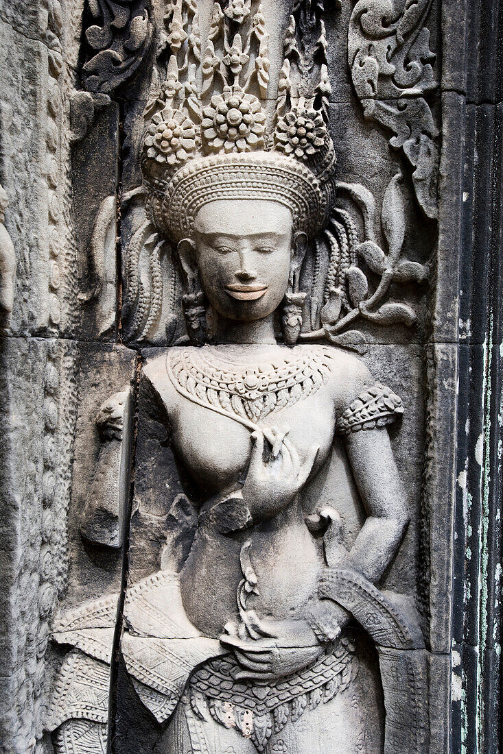 Female representation carved on wall of Bayon temple, Angkor, Siem Reap, Cambodia