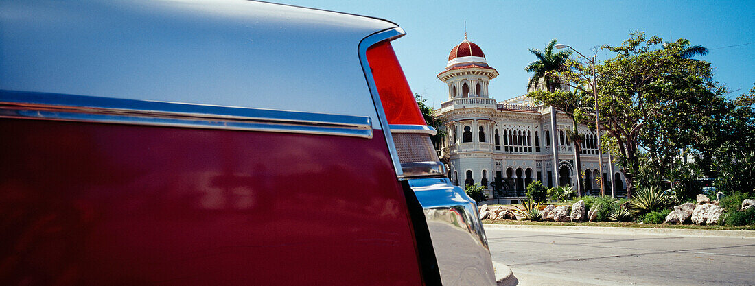 Car in front of Palacio de Valle, Cienfuegos, Cuba