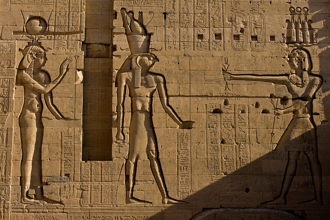 Large reliefs on walls of Second Pylon, Temple of Isis, Philae Island, near Aswan, Egypt