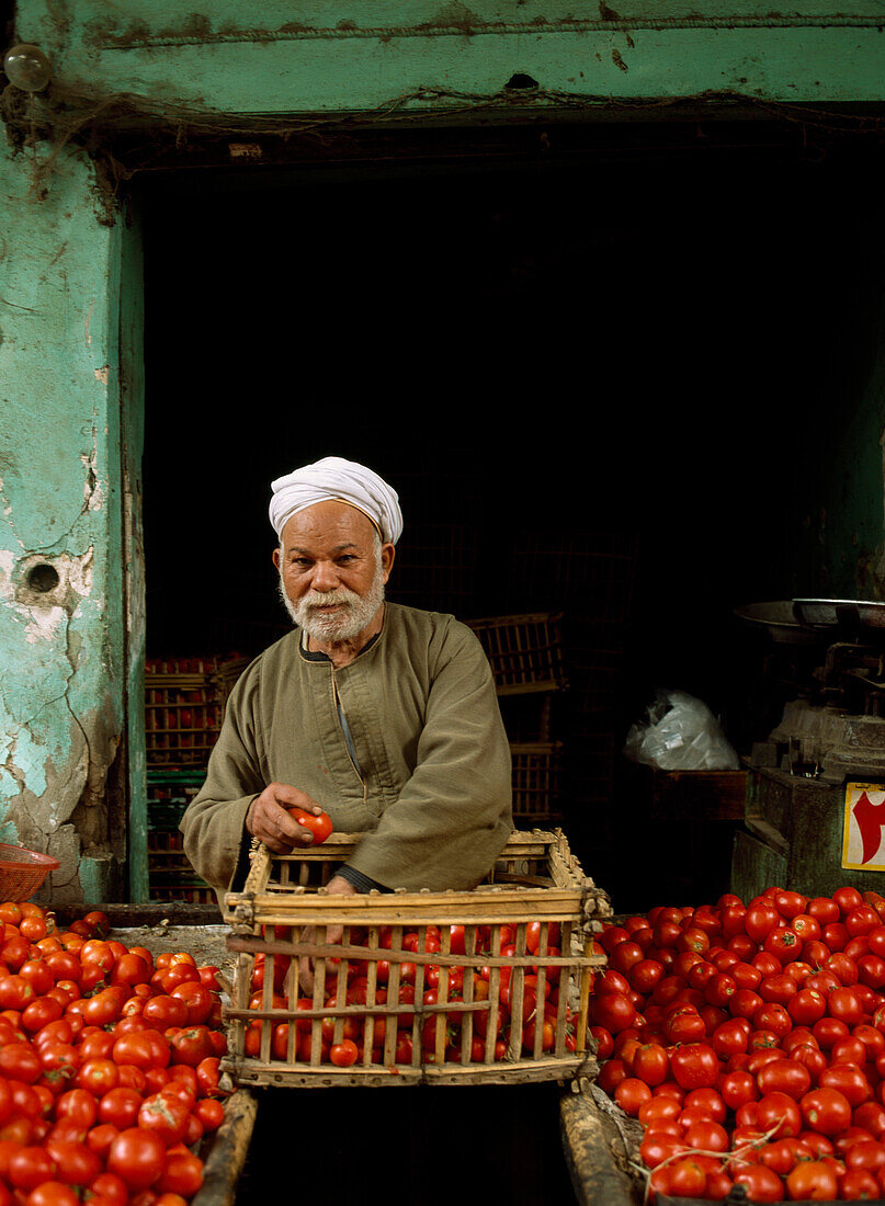 Tomato seller at stall, Cairo, Egypt