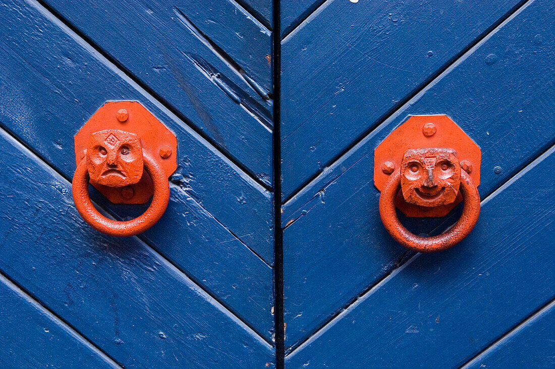 Smiling and unhappy door handle faces, Close Up, Tallinn. Estonia