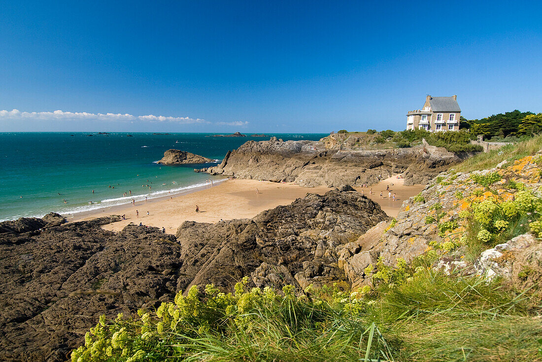 House perched above beach in the village of Rotheneuf near St Malo, Brittany, France