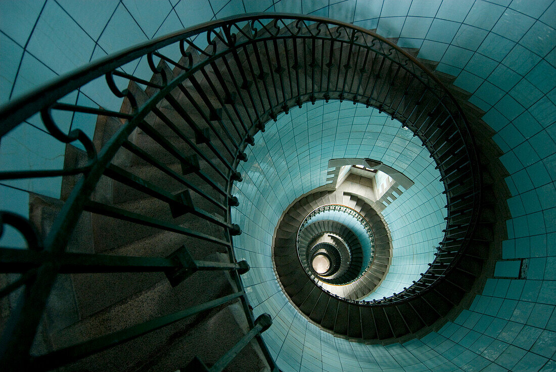 Looking down the spiral staircase of the lighthouse, Ile Vierge near Aber Wrach, Brittany, France