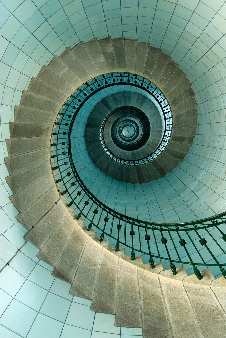 Looking up the spiral staircase of the lighthouse, Ile Vierge near Aber Wrach, Brittany, France